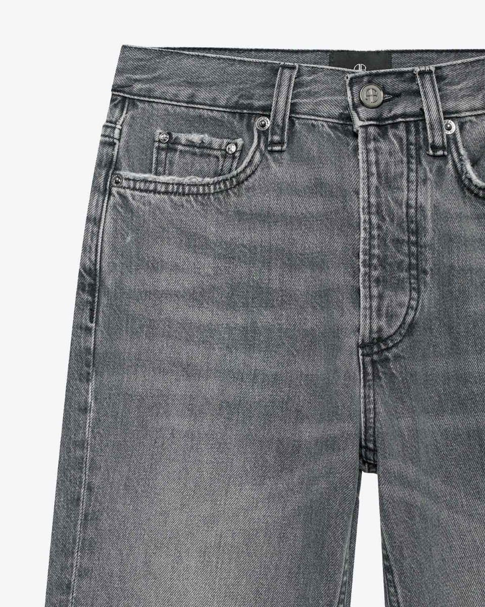 Jean Bruno Anine Bing en denim gris délavage Ash Grey. Détail de l'usure de la toile.