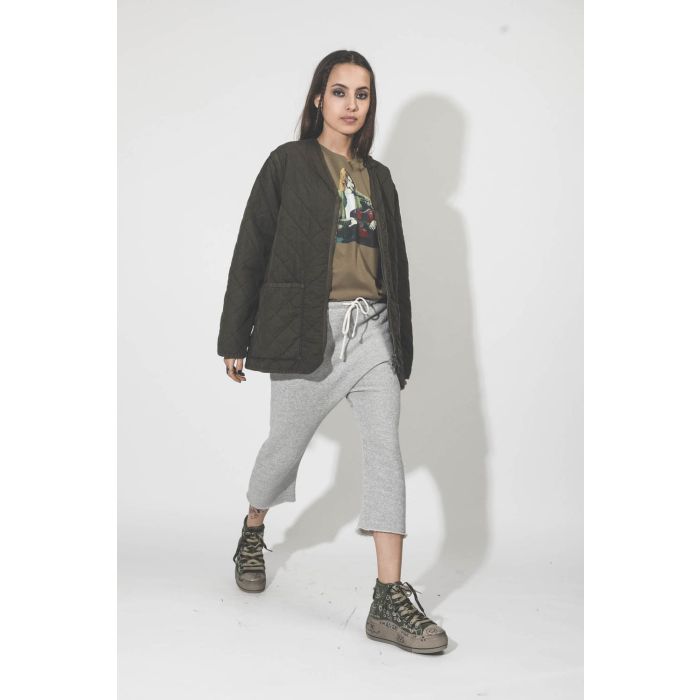 Pantalon en sweat sarouel gris chiné r13. Porté profil.