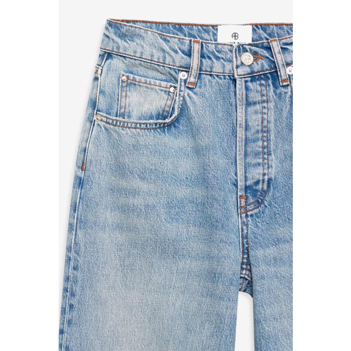 Jean taille haute jambe large Heath Anine Bing en coton régénératif bleu ciel. Détail du délavage bleu ciel. 
