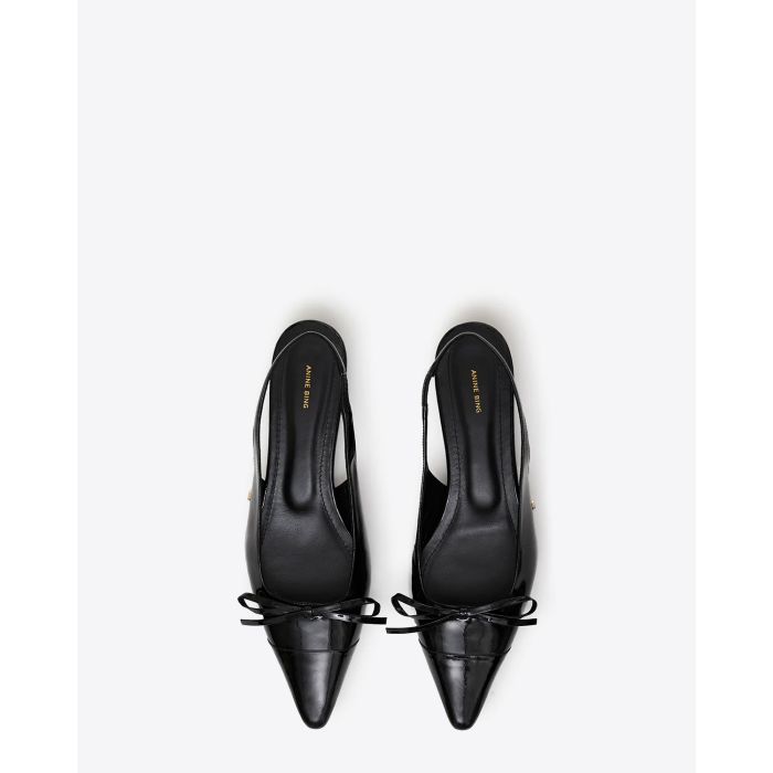 Ballerines Slingback Zoey Anine Bing en cuir noir. 