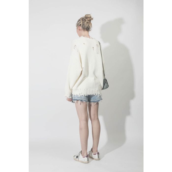 Short en jean Crossover bleu ciel R13 Denim. Porté dos.