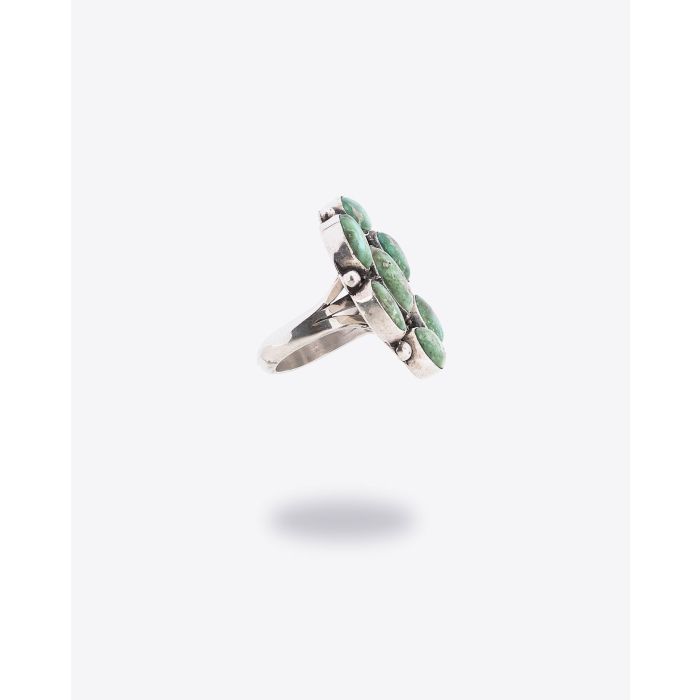 Bague Lake Carico Harpo forme fleur avec pierres turquoises.