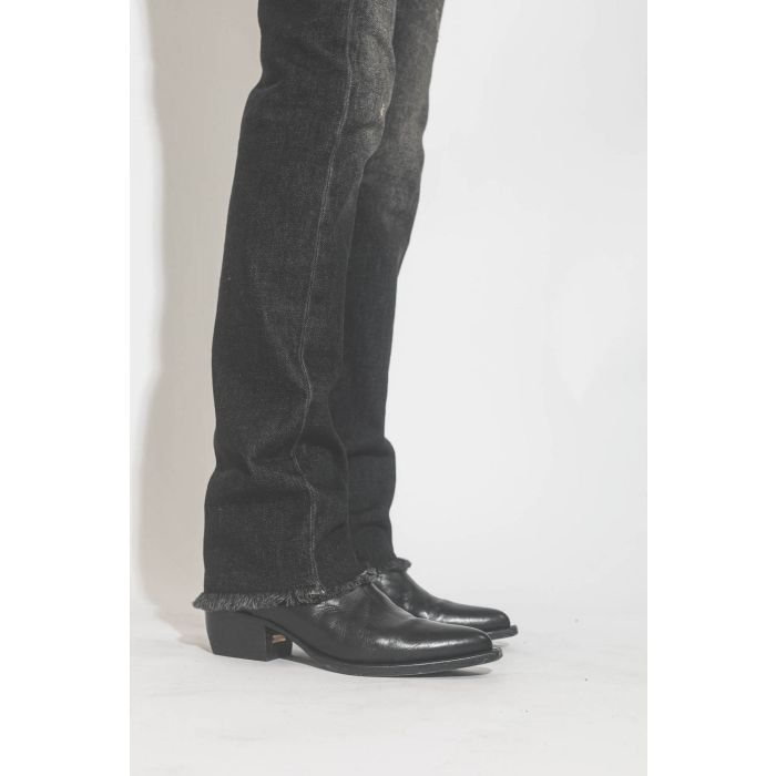 Boots santiags en cuir noir Debbie Beatles Golden Goose. Porté avec un jeans slim droit noir.