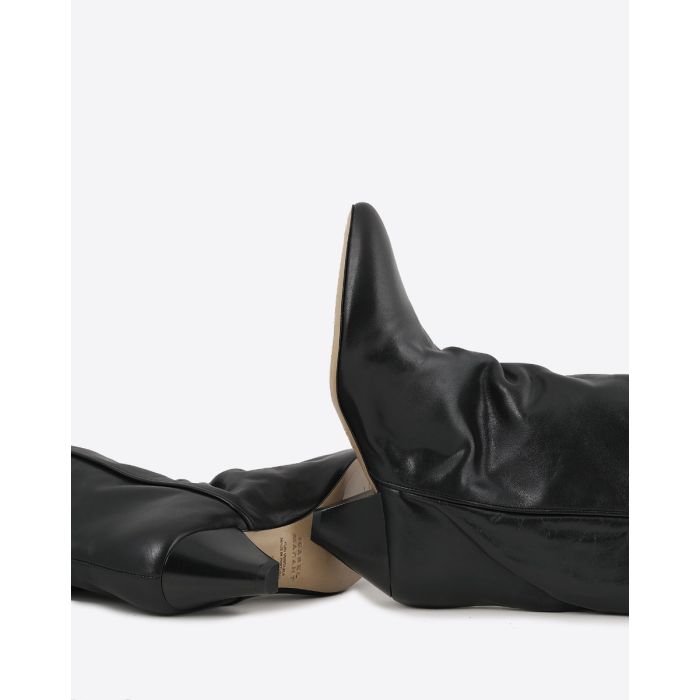 Bottes Elita Isabel Marant en cuir lisse noir. Détail dessous de la semelle en cuir.