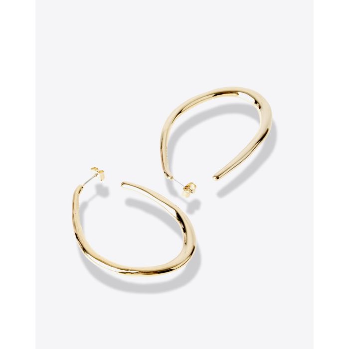 Boucles d'oreilles Pleasant Isabel Marant en laiton doré. Vue à plat.