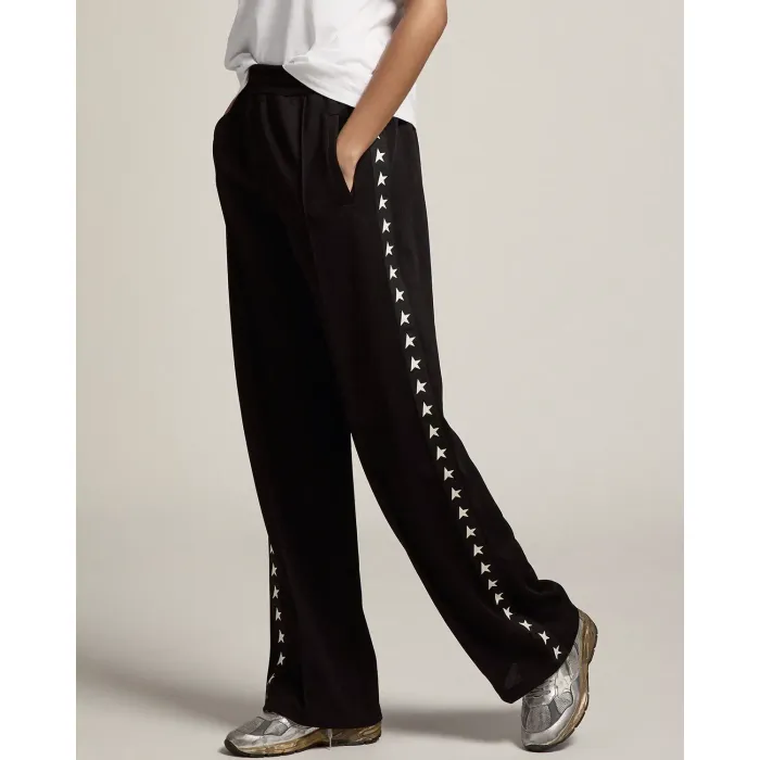 Pantalon de jogging noir avec étoiles blanches le long de la jambe Golden Goose. détail des poches.