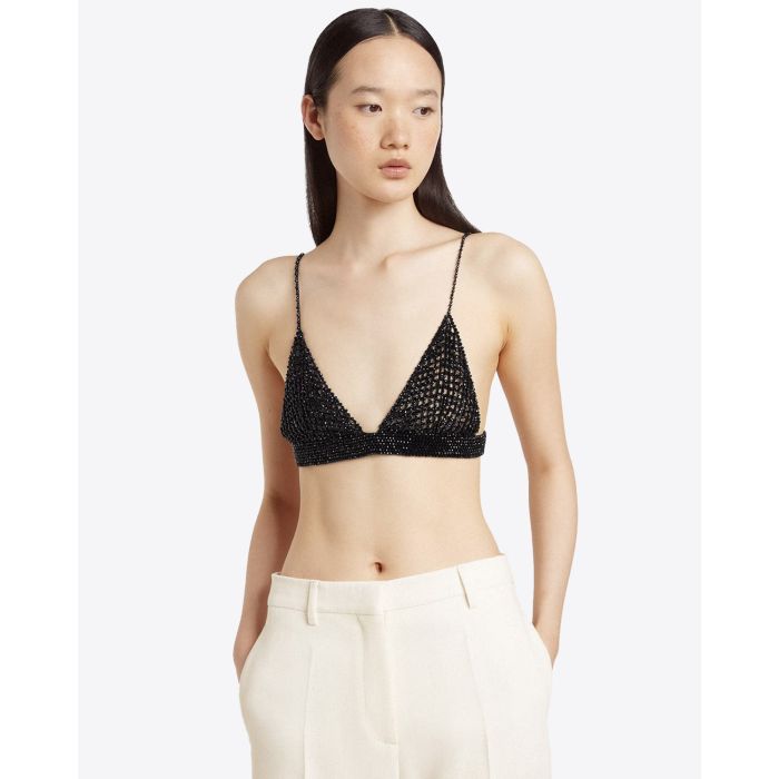 Soutien gorge triangle noir en crochet brodé de cristaux Golden Goose. Porté de face.