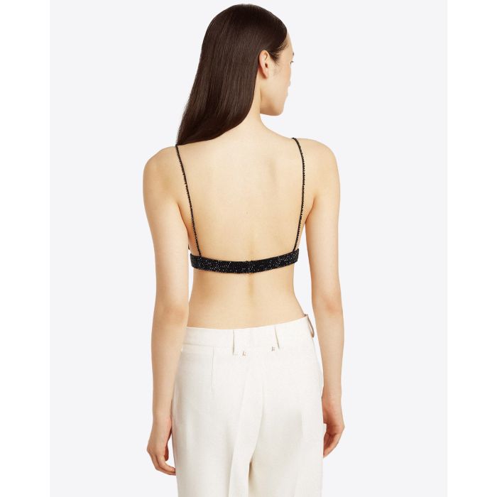Soutien gorge triangle noir en crochet brodé de cristaux Golden Goose. Porté de dos.