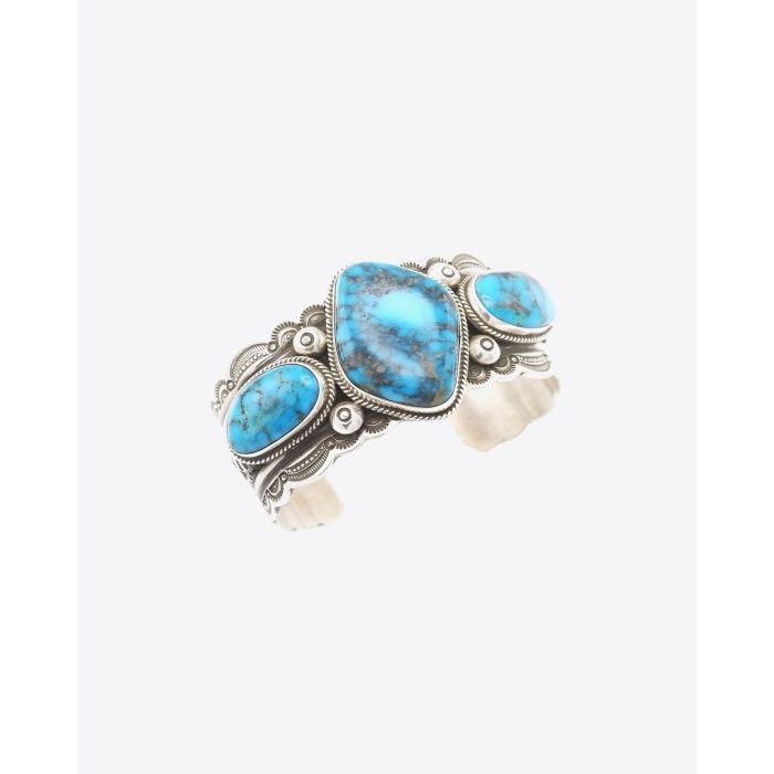 Bracelet manchette en argent ciselé et cabochon turquoise Harpo Paris.