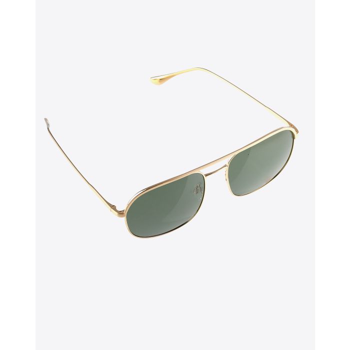 Lunettes Highland Anine Bing dorées. 
