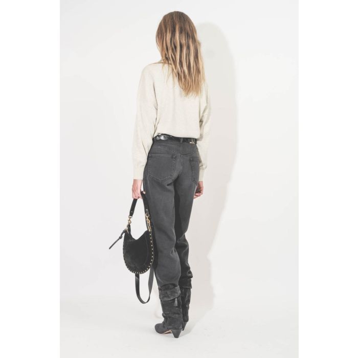 Boots Dalby Isabel Marant en cuir suédé noir délavé. Portées de dos avec un jean noir.