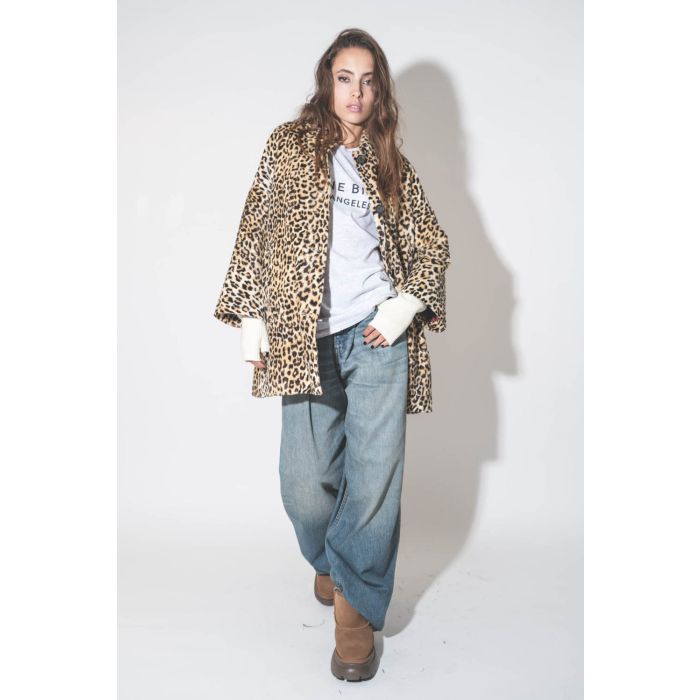 Mitaines en laine vierge écru Enos Isabel Marant. Porté avec un jean bleu.