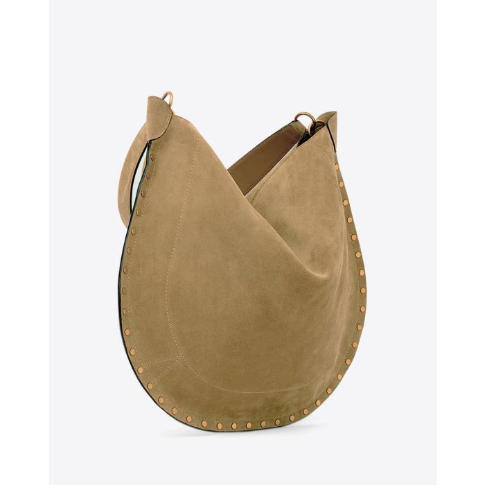 Sac Oskan Hobo soft Isabel Marant en cuir suédé taupe et clous dorés. Anse en cuir pour un porté épaule. Profil.