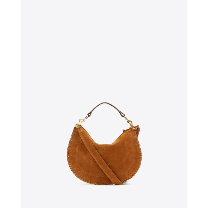 Sac Oskan Soft Zip Isabel Marant en cuir suédé cognac et tressé. Petite anse porté main ou épaule et longue bandoulière pour un porté épaule ou croisé. Dos et détail de la anse amovible. 
