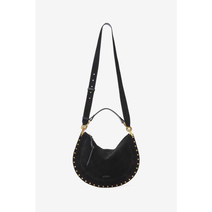 Sac Oskan Soft Zip Isabel Marant en cuir suédé noir et clous. Anse courte pour un porté main ou épaule et bandoulière pour un porté épaule ou croisé. Détail de la bandoulière longue. Face.