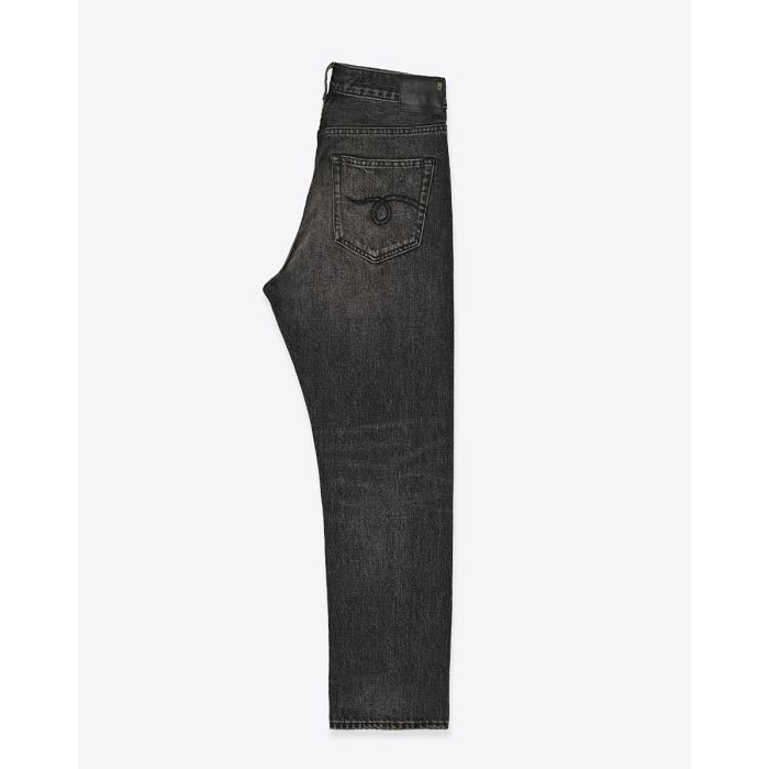 Jean crossover R13 en denim noir Ashbury. Vue de profil.