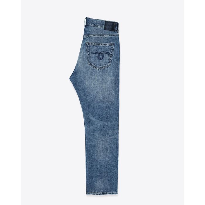 Jean crossover R13 en denim bleu déchiré Léo Blue. Vue de profil.