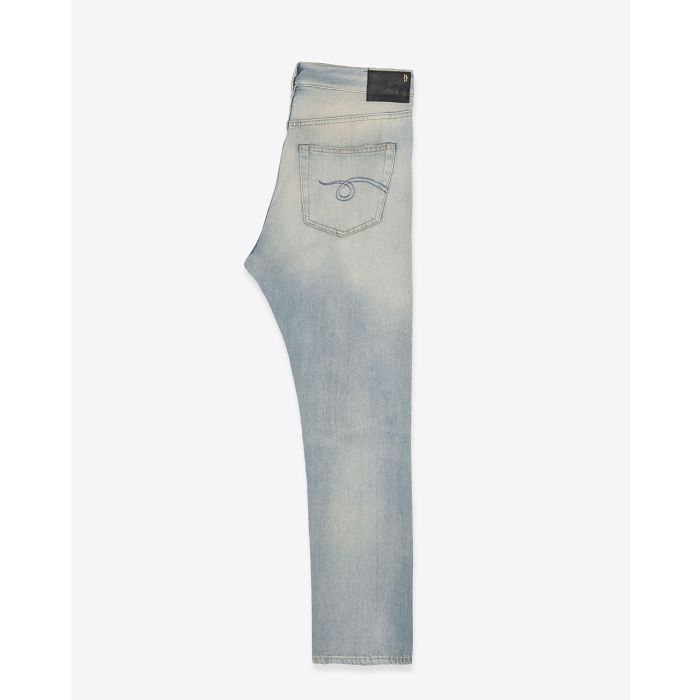Jean Crossover R13 en denim coton délavé. Vue profil.