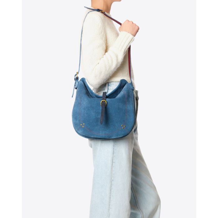 Sac Luis Jérôme Dreyfuss en cuir effet jean porté sur l'épaule.