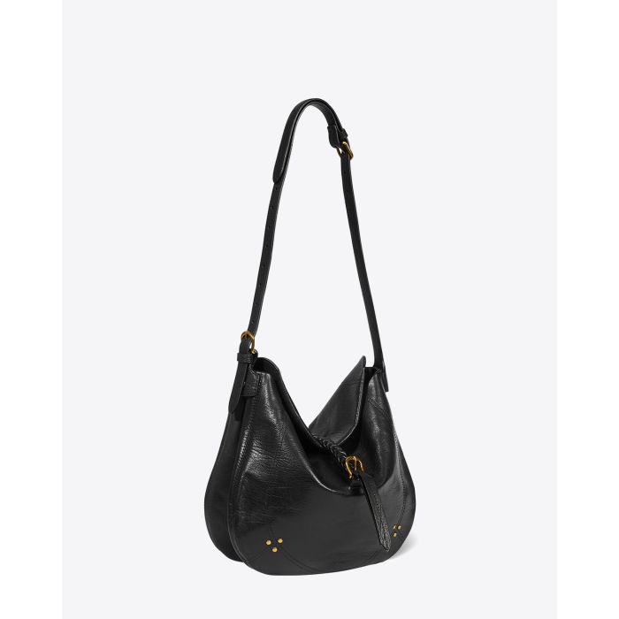 Sac besace en cuir grainé noir Luis Jérôme Dreyfuss. Profil. Porté épaule ou croisé bandoulière longue. 