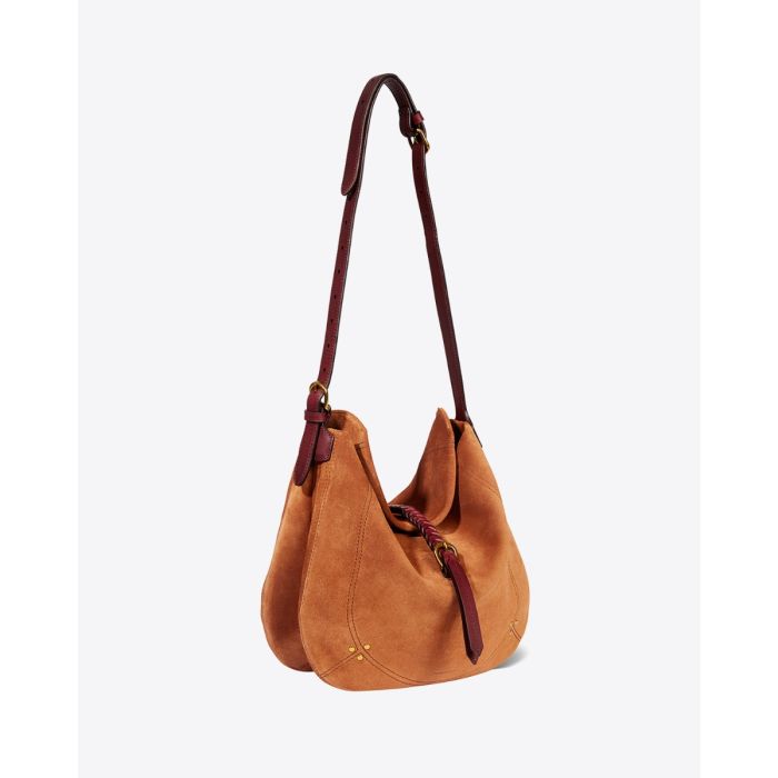 Sac Luis Jérôme Dreyfuss en cuir suédé caramel. Forme besace souple à bandoulière porté main, épaule ou croisé. Détail de la bandoulière longue. Profil.