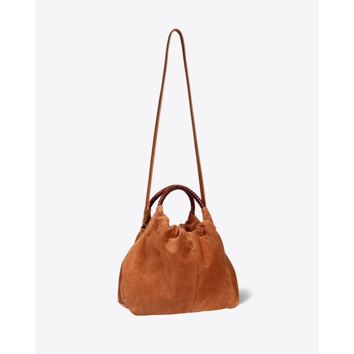 Sac Gordi M Jérôme Dreyfuss en cuir suédé caramel. Anses rondes en cuir tressé et bandoulière longue amovible. Porté main, épaule ou croisé. Détail de la bandoulière longue.