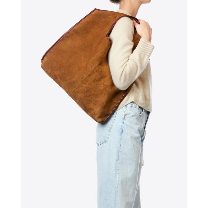 Sac Paco Jérôme Dreyfuss en cuir velours suédé tabac. Porté à l'épaule. 