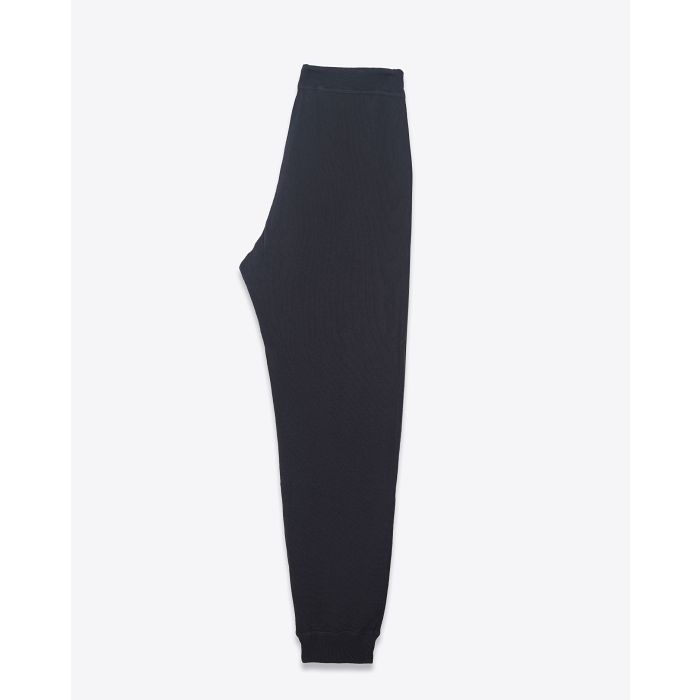 Pantalon de jogging taille basse à nouer sur les hanches resserré en bas bord côte noir The Cropped Sweatpant The Great. Profil.