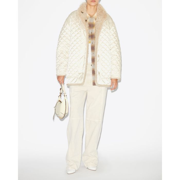 Manteau fausse fourrure écru réversible Carolina Isabel Marant Etoile. Porté du côté matelassé.