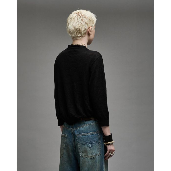 Gilet court manches 3/4 en lin noir Balloon Cardigan R13. Porté de profil dos.