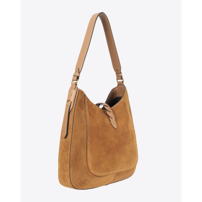 Sac Altay Hobo Isabel Marant en cuir suédé cognac. Porté main ou épaule. Profil.