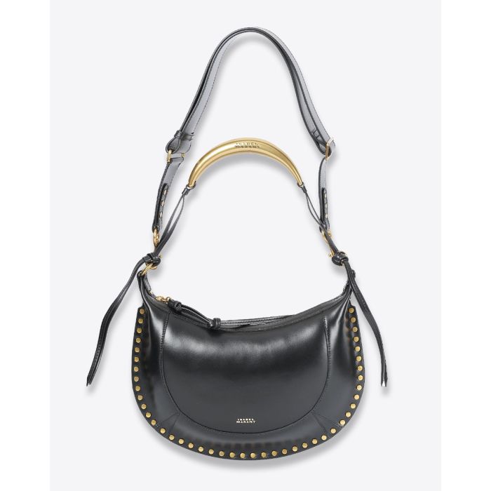 Sac Naoko bijou Isabel Marant en cuir lisse noir. Poignet bijou en métal doré gravé "Isabel Marant". Détail de la anse bijou et de la bandoulière. Porté main, épaule ou croisé.
