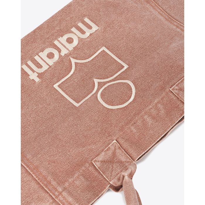 Cabas en toile Yenky zip Isabel Marant. Coloris Rust délavé avec logo "MARANT" brodé devant. Détail de la toile en coton et du logo brodé blanc