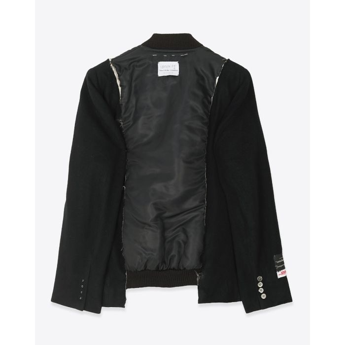 Dos du Bomber Profilo en cachemire et nylon noir avec couture artisanale et étiquette upcycling Yekaterina Ivankova. 