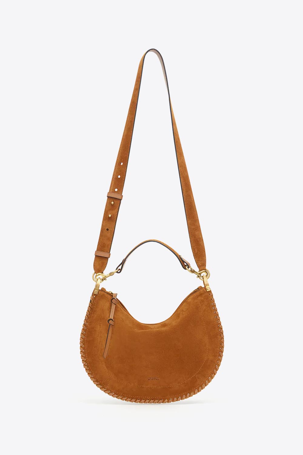 Sac Oskan Soft Zip Isabel Marant en cuir suédé cognac et tressé. Petite anse porté main ou épaule et bandoulière pour un porté épaule ou croisé. Détail de la bandoulière longue. Face.