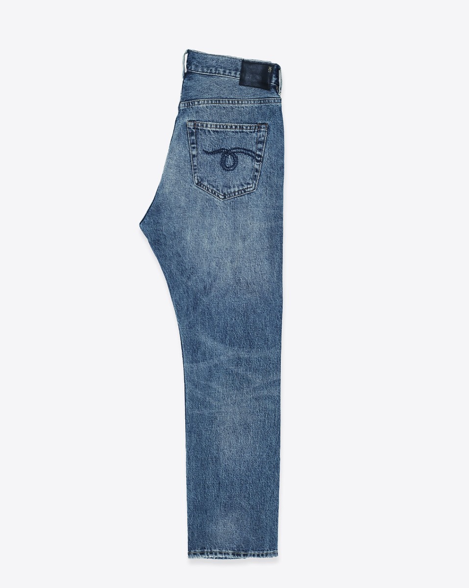 Jean crossover R13 en denim bleu déchiré Léo Blue. Vue de profil.