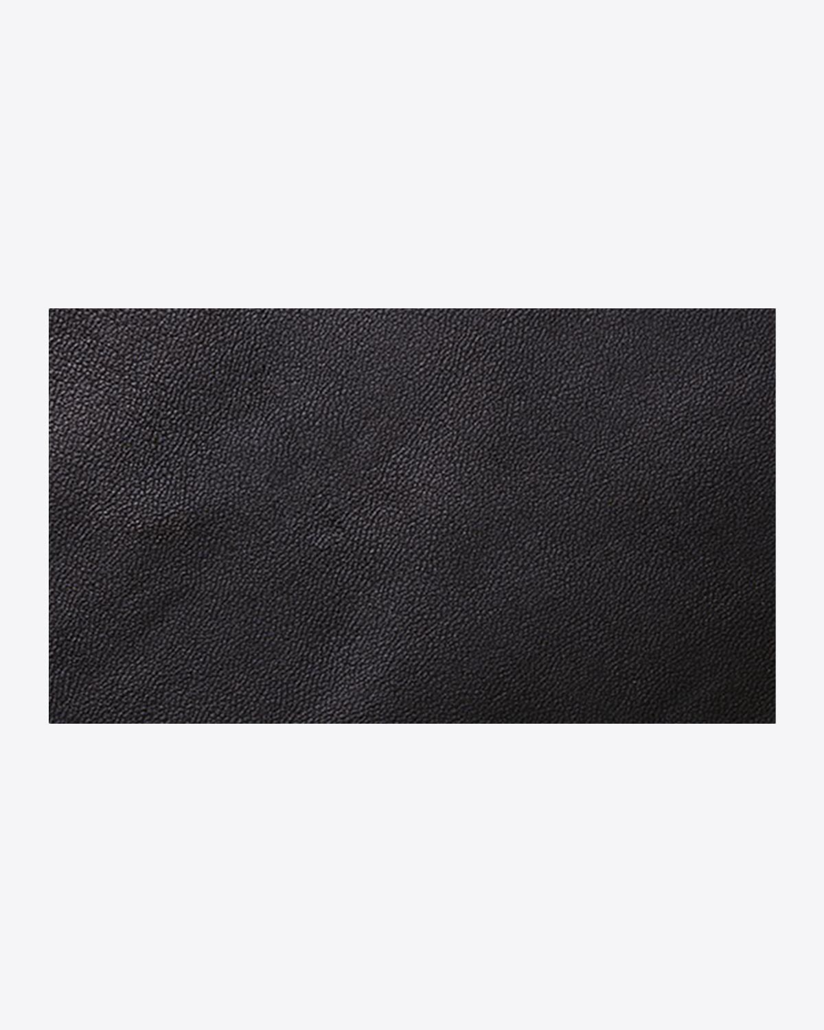 Matière cuir chèvre noir grainé Jérôme Dreyfuss.