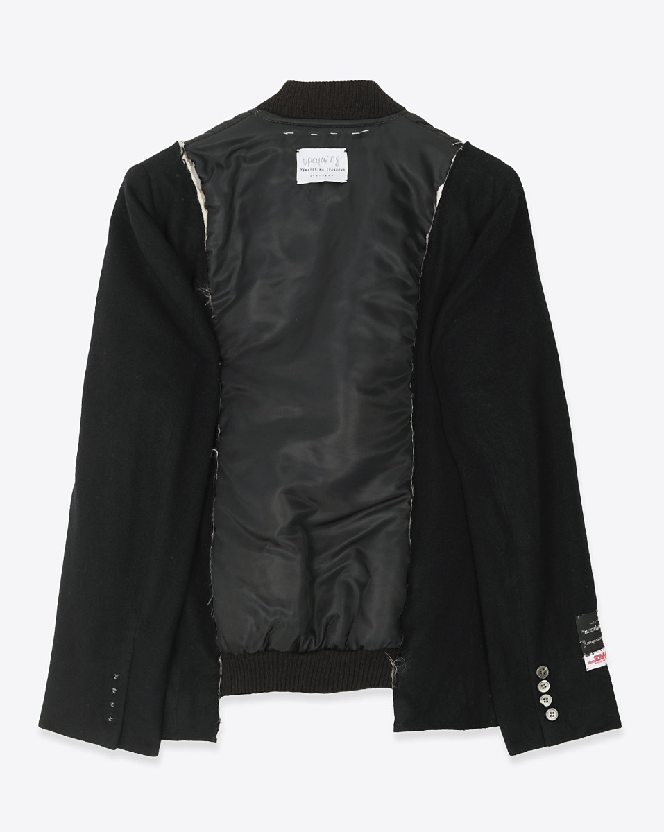 Dos du Bomber Profilo en cachemire et nylon noir avec couture artisanale et étiquette upcycling Yekaterina Ivankova. 